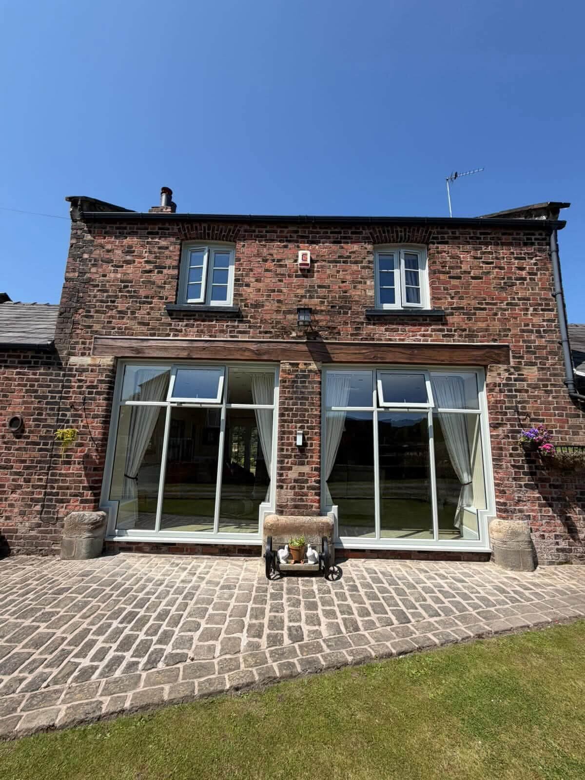 Brick cottage with bi-fold doors onto the garden