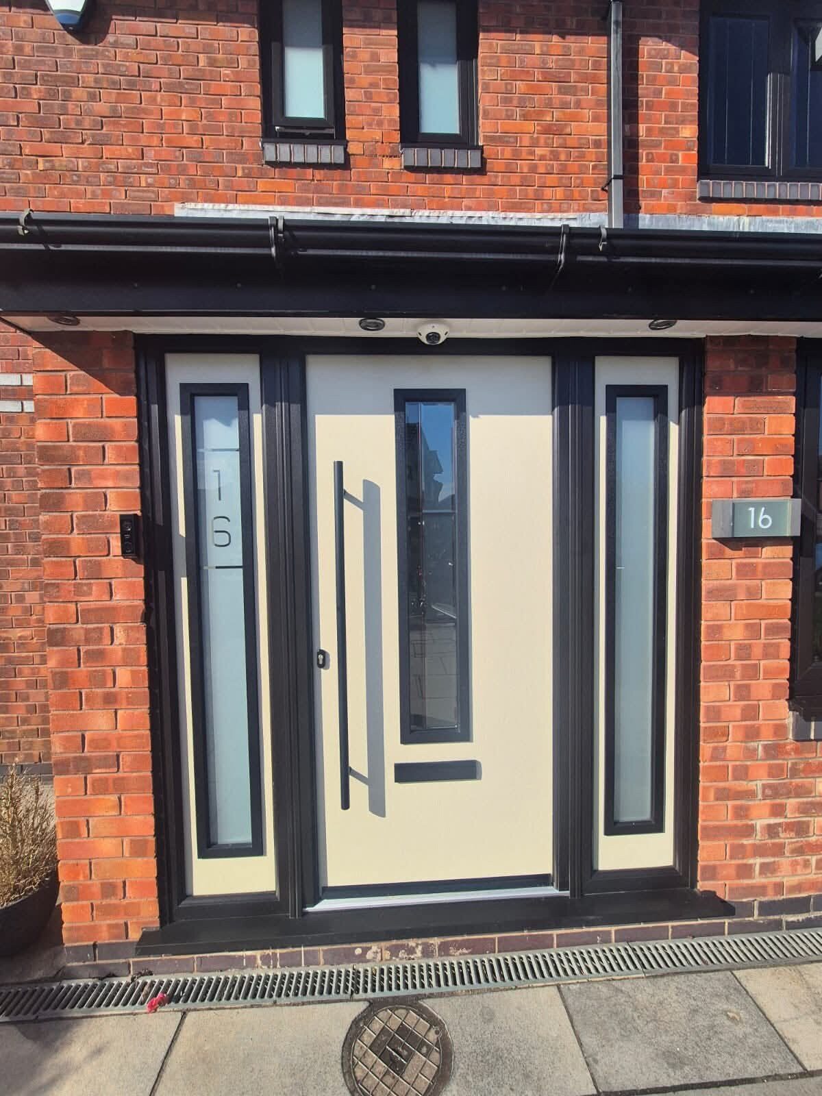 Cream composite front door with glazed side panels