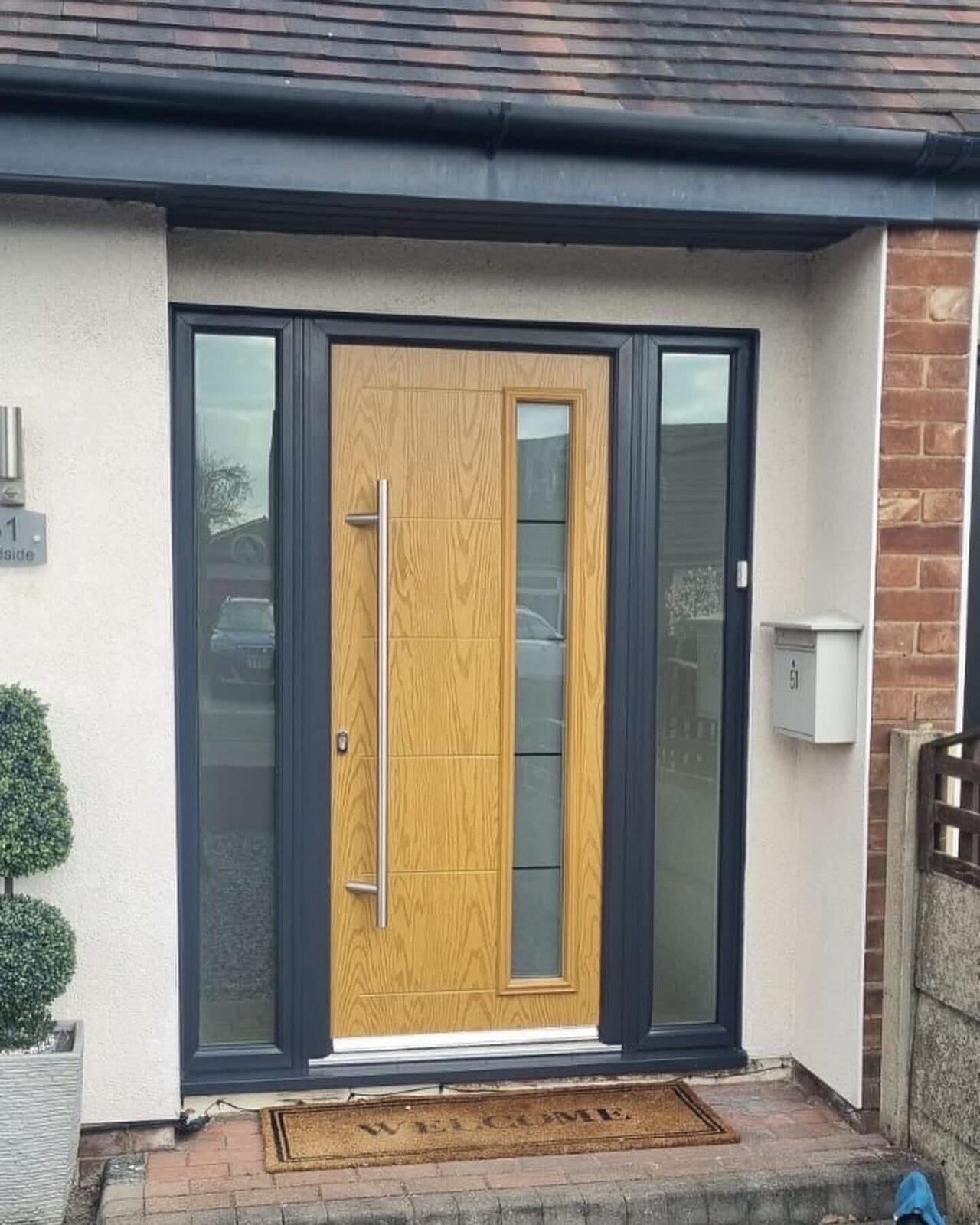Oak-effect composite front door